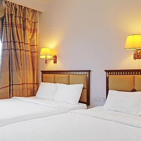 Super Oyo 90464 Borneo Suites Hotel 亞庇 外观 照片
