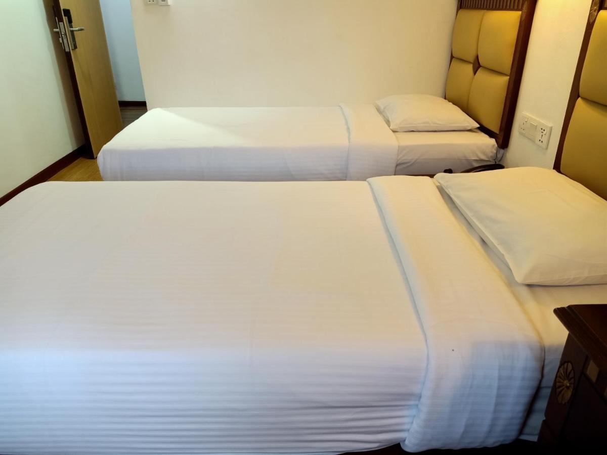 Super Oyo 90464 Borneo Suites Hotel 亞庇 外观 照片