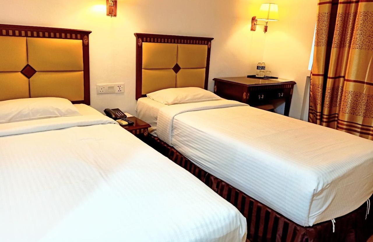 Super Oyo 90464 Borneo Suites Hotel 亞庇 外观 照片