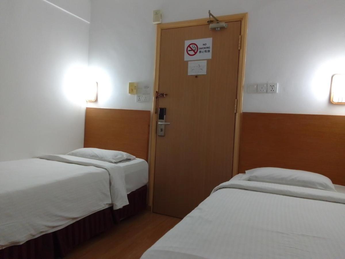 Super Oyo 90464 Borneo Suites Hotel 亞庇 外观 照片