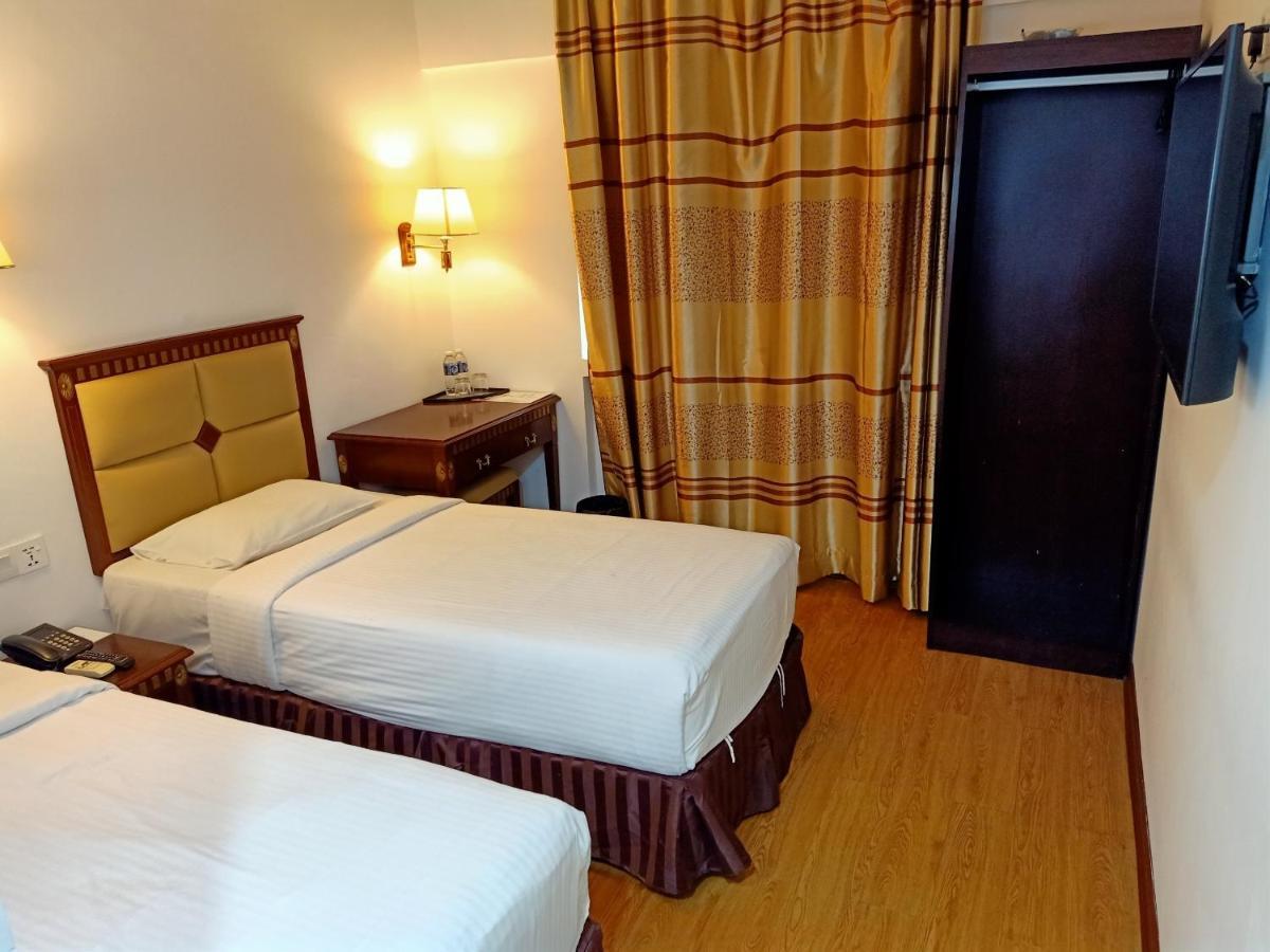 Super Oyo 90464 Borneo Suites Hotel 亞庇 外观 照片