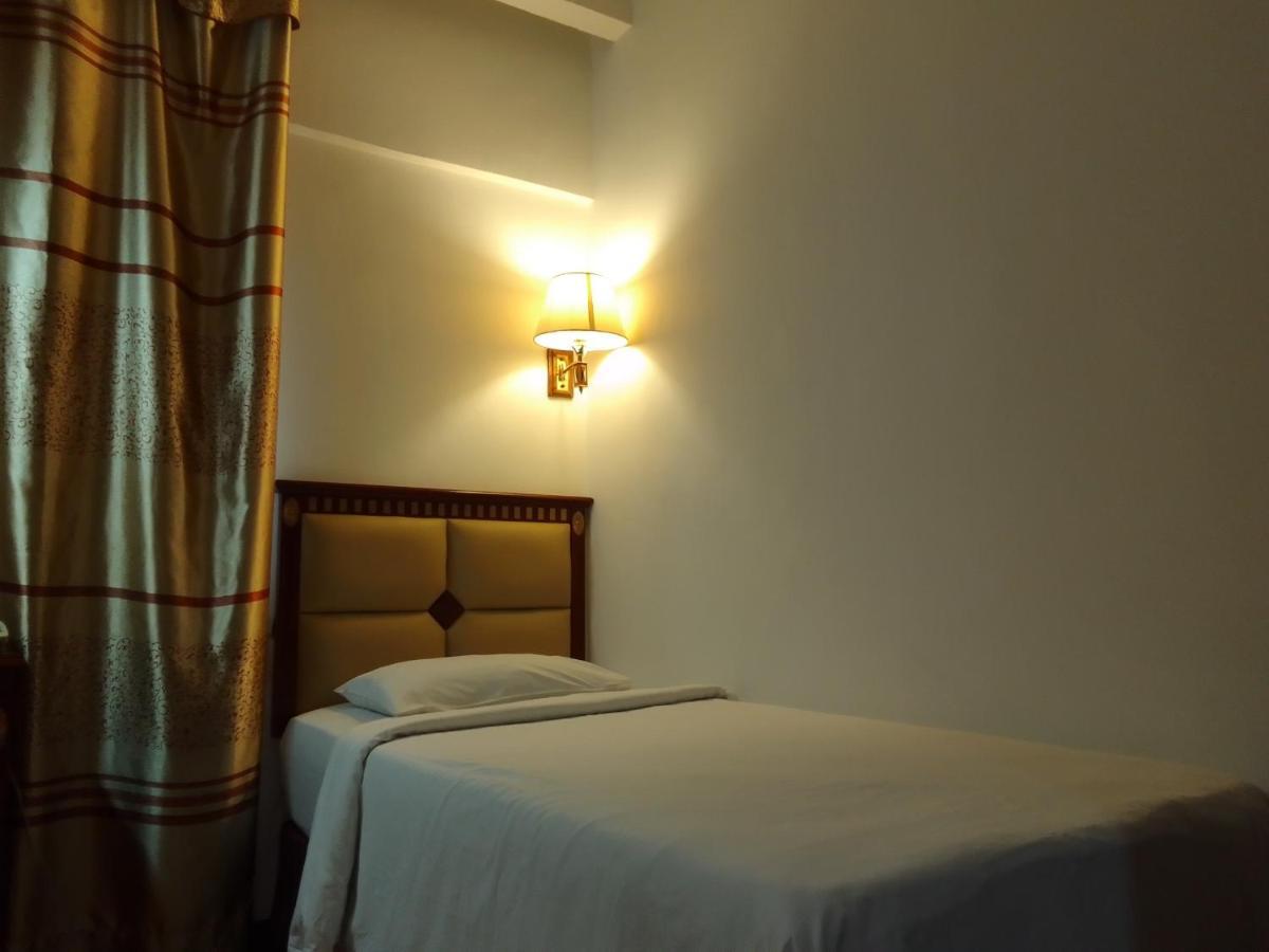 Super Oyo 90464 Borneo Suites Hotel 亞庇 外观 照片