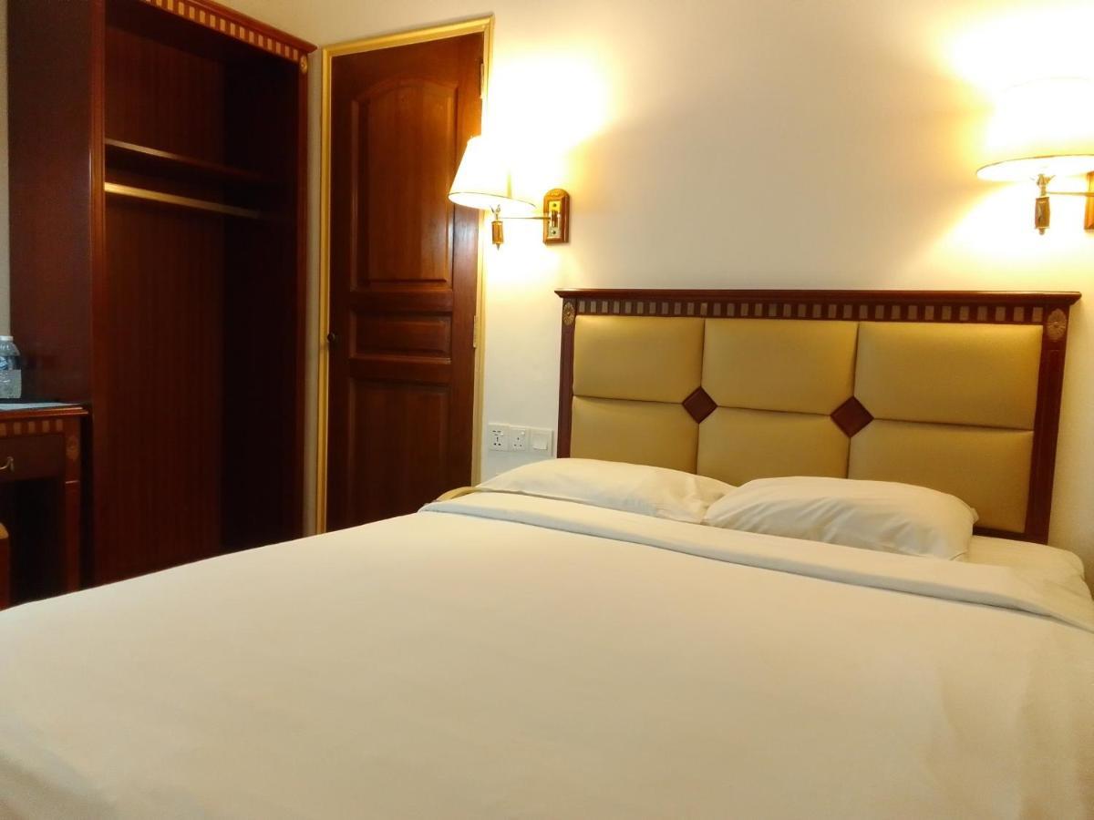 Super Oyo 90464 Borneo Suites Hotel 亞庇 外观 照片