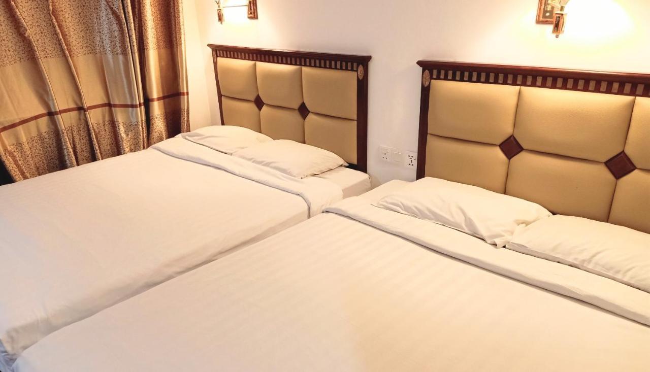 Super Oyo 90464 Borneo Suites Hotel 亞庇 外观 照片