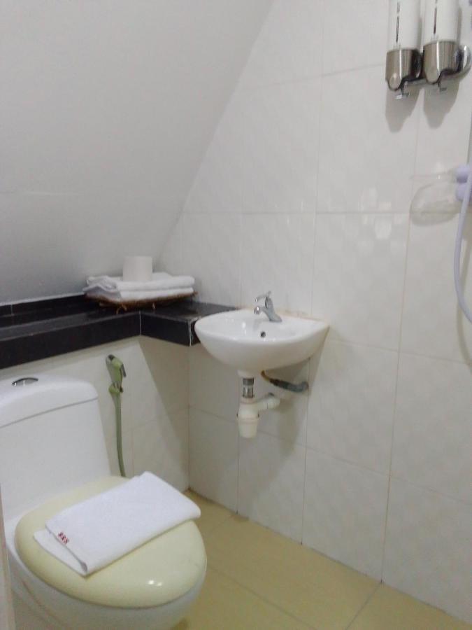 Super Oyo 90464 Borneo Suites Hotel 亞庇 外观 照片