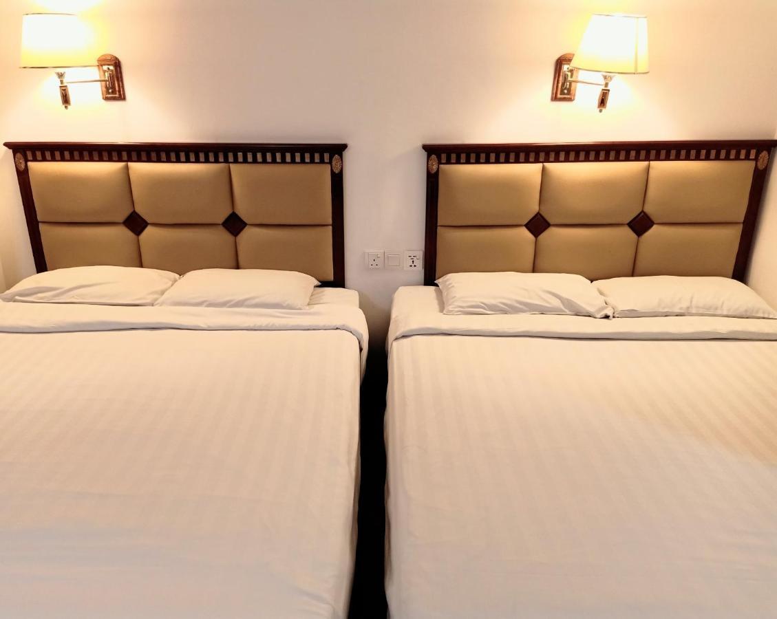 Super Oyo 90464 Borneo Suites Hotel 亞庇 外观 照片