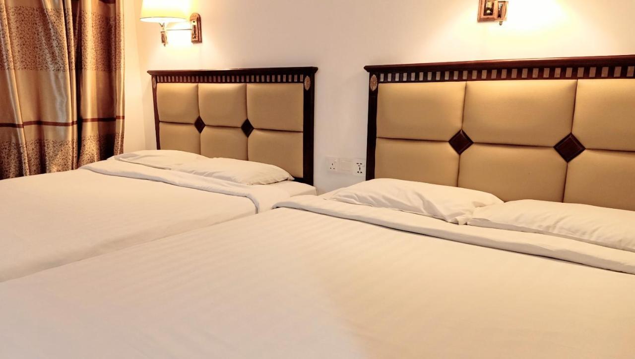 Super Oyo 90464 Borneo Suites Hotel 亞庇 外观 照片