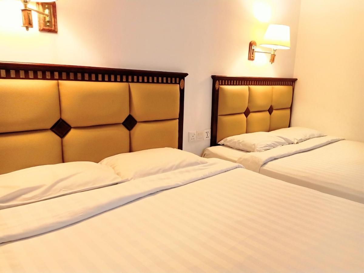 Super Oyo 90464 Borneo Suites Hotel 亞庇 外观 照片